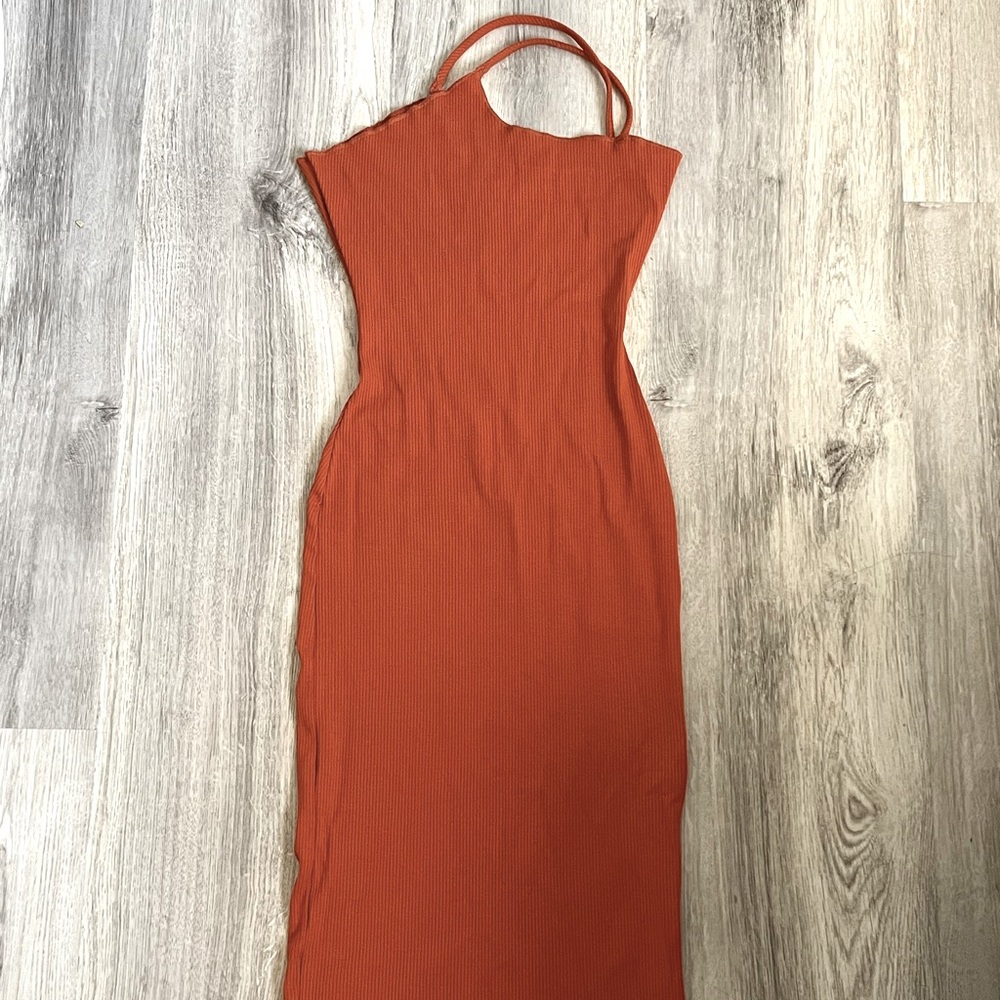 Naked wardrobe dress: Burnt orange one shoulder shape wear midi dress.